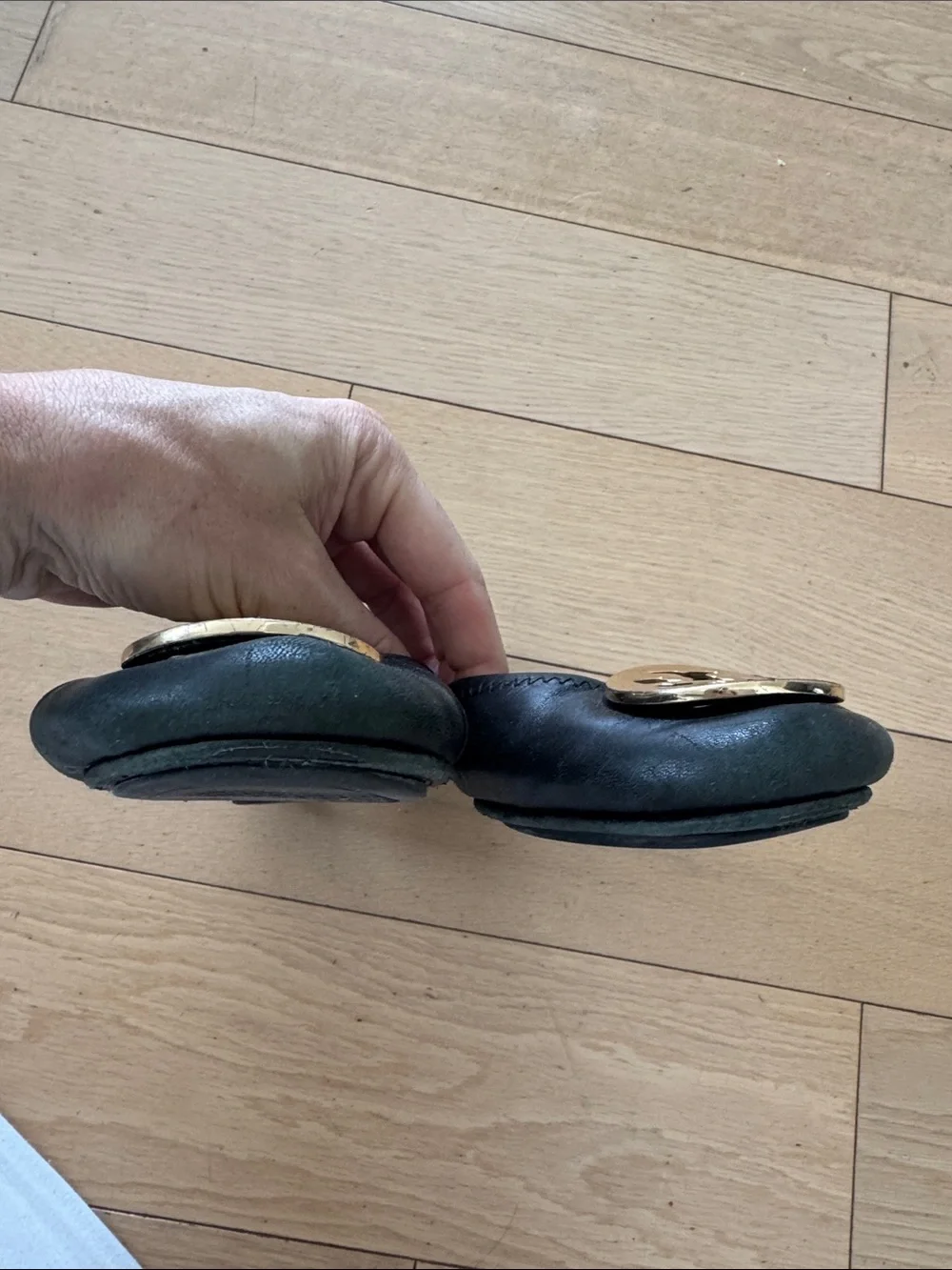 Tory Burch Black Ballet Flats with Gold Logo Medallions